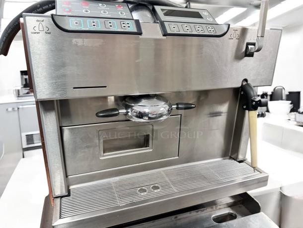 La Cimbali M1 TurboSteam espresso machine in superb condition, fully tested, stainless steel finish, digital controls visible.