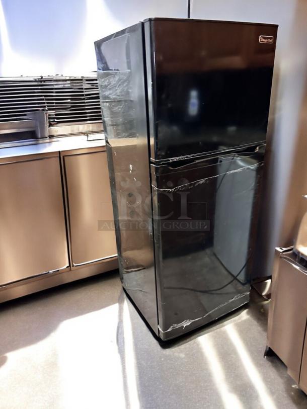 Magic Chef HVDR1040B 10.4 Cu. Ft. top freezer refrigerator in black, excellent condition, fully tested, minor scuffs visible.