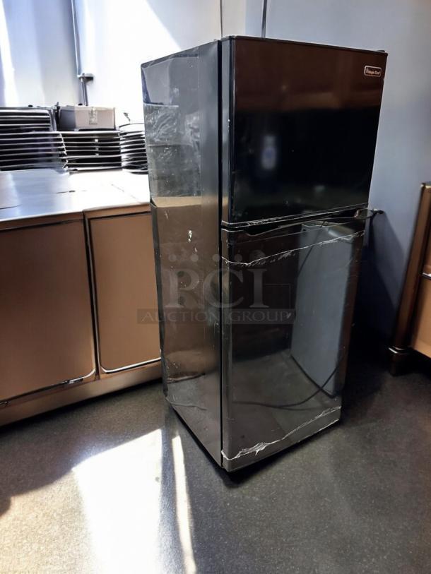 Magic Chef HVDR1040B 10.4 Cu. Ft. top freezer refrigerator in black; excellent condition, fully tested and working.