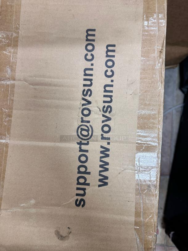 Alt text: Cardboard box labeled with "support@rovsun.com" and "www.rovsun.com." Contains Zokop BD-40-E chest freezer.