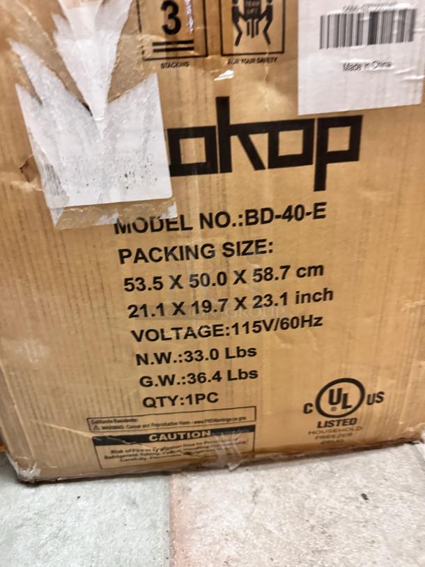 Brand new Zokop BD-40-E compact chest freezer in original box. Model number and dimensions listed on packaging.