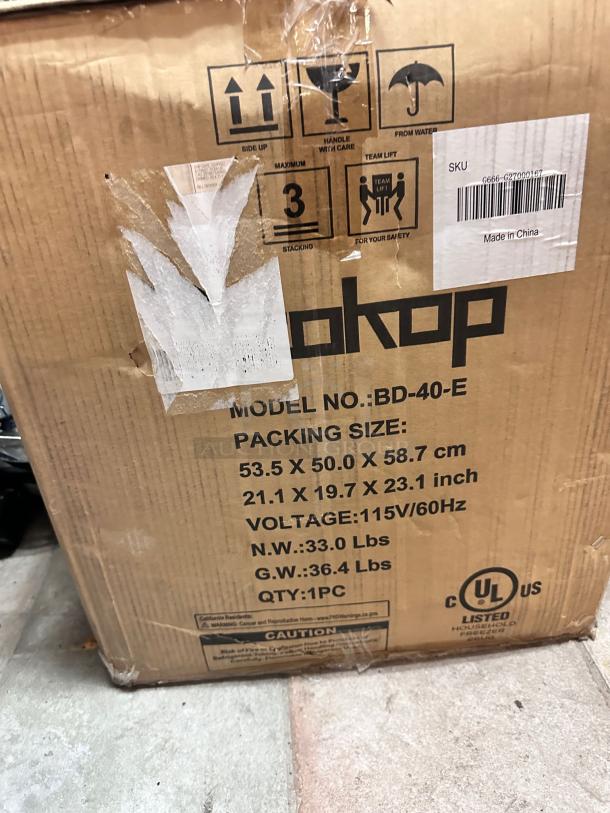 Brand new Zokop BD-40-E compact chest freezer in original box. 1.1 Cu. Ft., 115V, fully tested and working, model details visible.