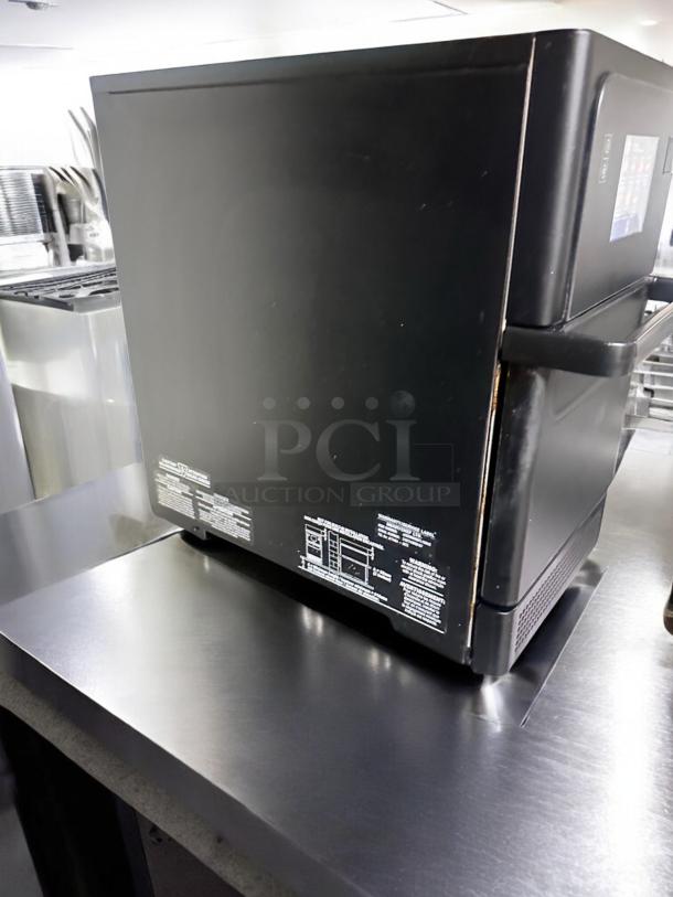 TurboChef Sota rapid cook high-speed oven, excellent condition, 208V. Black finish, clear model and testing labels visible.