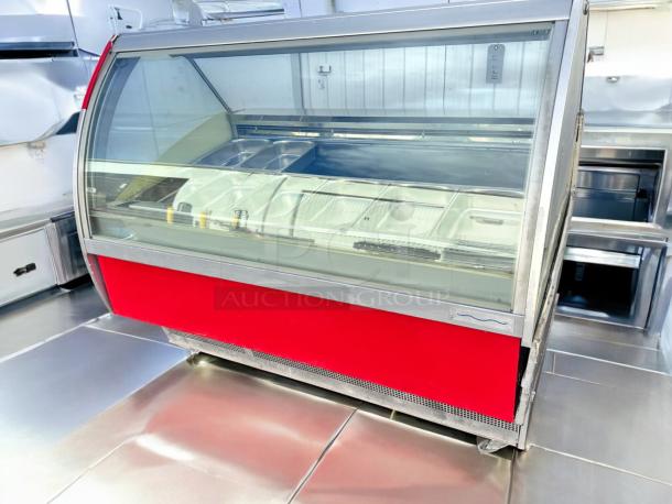 Red and silver Zorzi Italia Koriea C83FK-9SC display case. Curved glass, multiple trays, excellent condition, fully tested.
