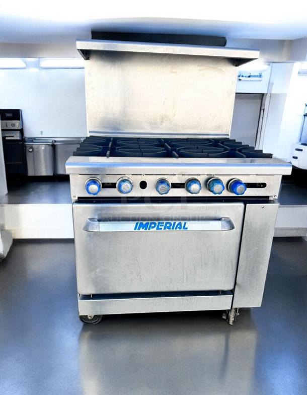 Imperial IR-6 36" gas range with 6 burners and oven, excellent condition, stainless steel, natural gas, fully tested.