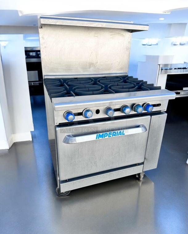 Imperial IR-6 36" gas range with 6 burners, standard oven, natural gas, excellent condition, fully tested, branded "Imperial".