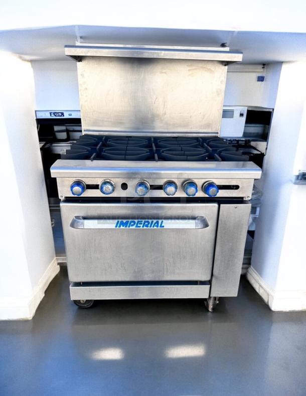Imperial IR-6 36" gas range with 6 burners and oven, in outstanding condition, natural gas, fully tested, stainless steel finish.
