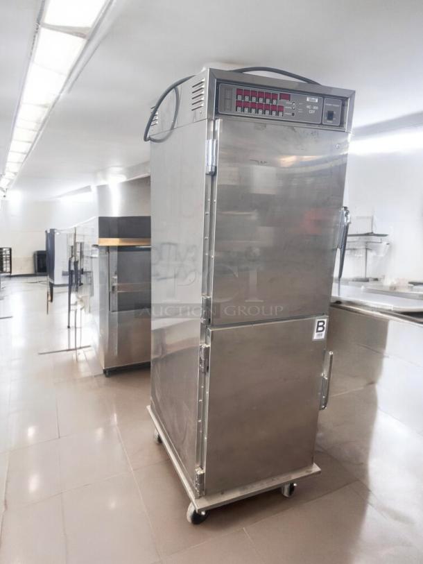 Henny Penny HC-900 heated holding cabinet, excellent condition, stainless steel, 120V, fully tested, mobile on casters.