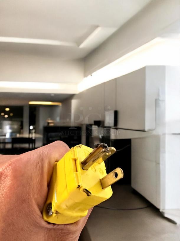 Alt text: Henny Penny HC-900 heated holding cabinet in excellent condition, 120V. Fully tested and working, yellow power plug shown.