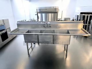 Stainless steel 3-compartment sink with dual drainboards, 96" x 31", excellent condition, fully tested and working.