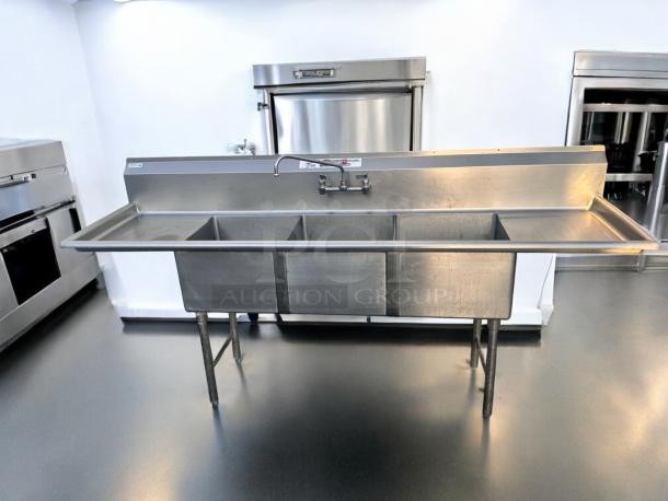 Stainless steel 3-compartment sink with dual drainboards, 96"x31", excellent condition, fully tested and working.