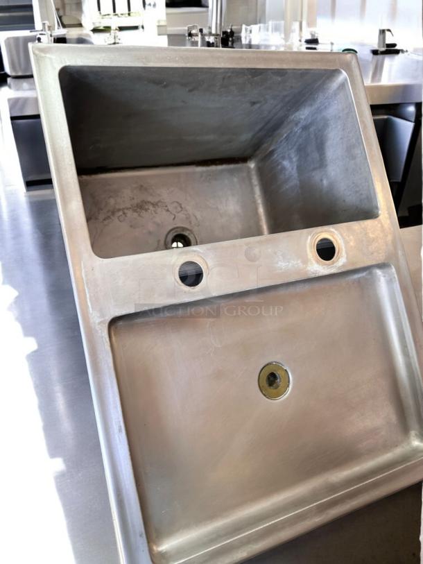 Superb condition stainless steel 3-compartment sink with dual drainboards, fully tested and functional, shown in kitchen setting.