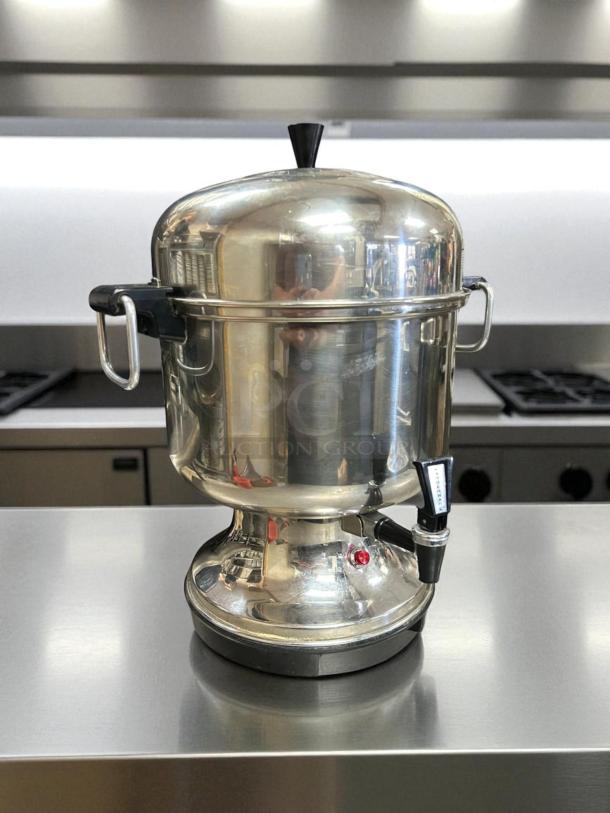 Farberware electric percolator coffee maker model L-1360, stainless steel, 36-cup capacity, fully tested, great condition.