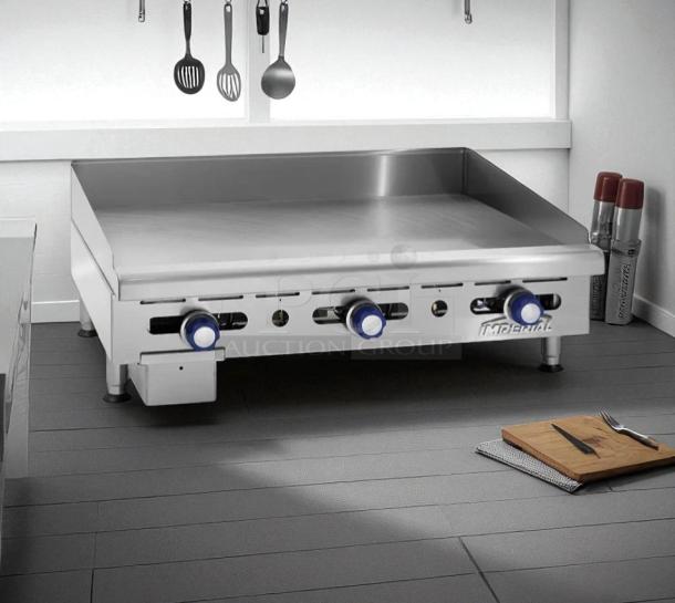 Imperial IMGA-4828 48" commercial gas griddle, 3/4" plate, steel knobs, brand logo visible, tested and working.