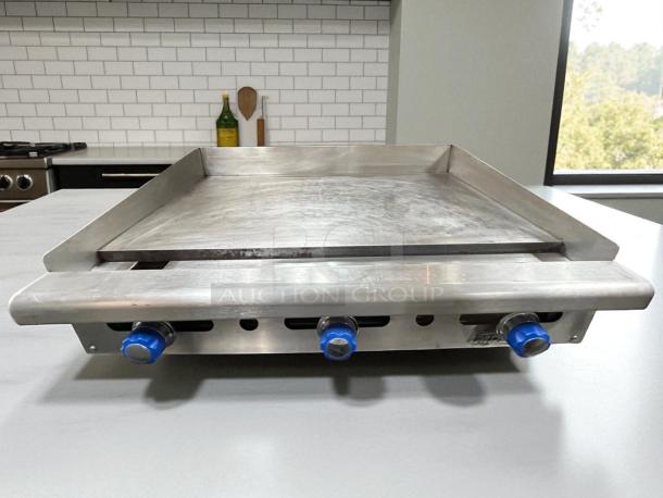 Imperial IMGA-4828 48" commercial gas griddle with 3/4" plate. Tested, fully functional, stainless steel with control knobs.