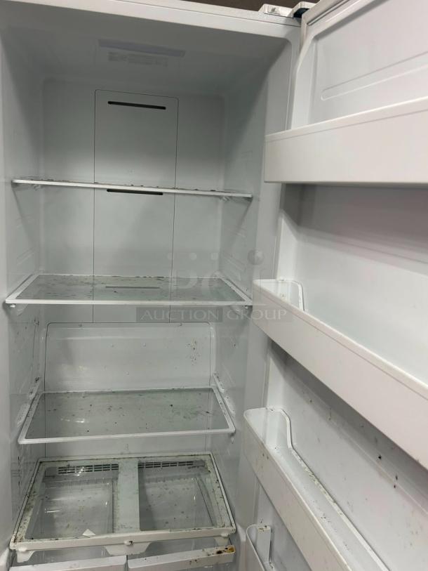Insignia™ 13.8 Cu. Ft. Garage Ready Convertible Upright Freezer, ENERGY STAR certified, good condition, shelves inside.
