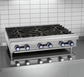 Imperial 24" countertop gas range, model IR-4-C, with 4 open burners, heavy-duty cast iron, excellent condition.