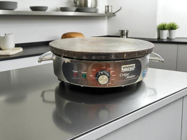 Waring WSC160X 16" Electric Crepe Maker, 120V, great condition. Features temperature control, labeled "Waring Commercial Crepe Maker."