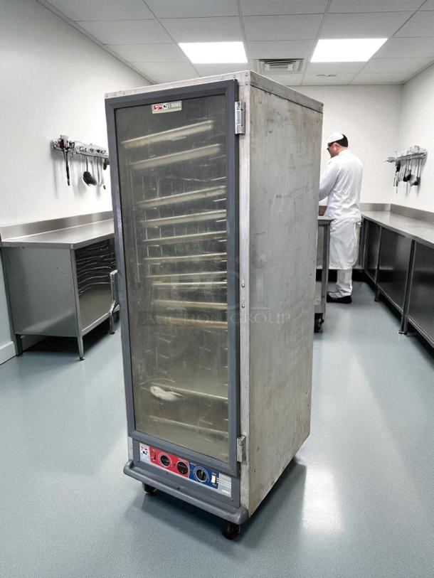 Metro C519-CFC-U heated proofing cabinet in good condition. Features clear door, multiple shelves, and intact control panel.