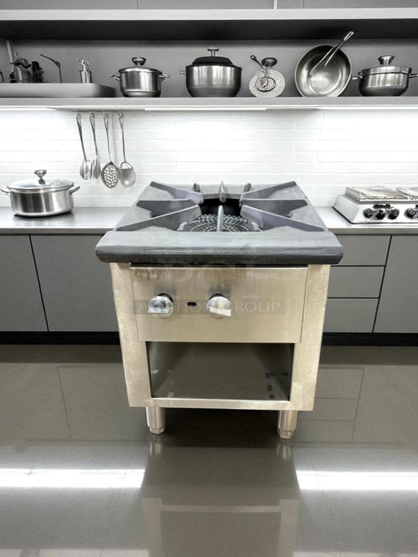 Commercial 3-ring gas stock pot burner in excellent condition, stainless steel, tested and working, with dual control knobs.