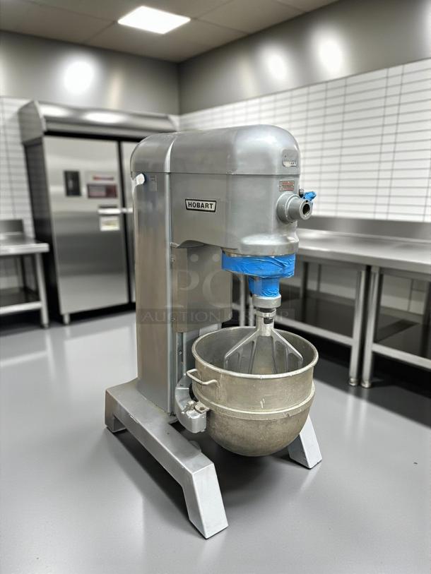 Hobart Model H600T 60QT dough mixer in stainless steel, 220/240v, single-phase. Includes mixing bowl and paddle.