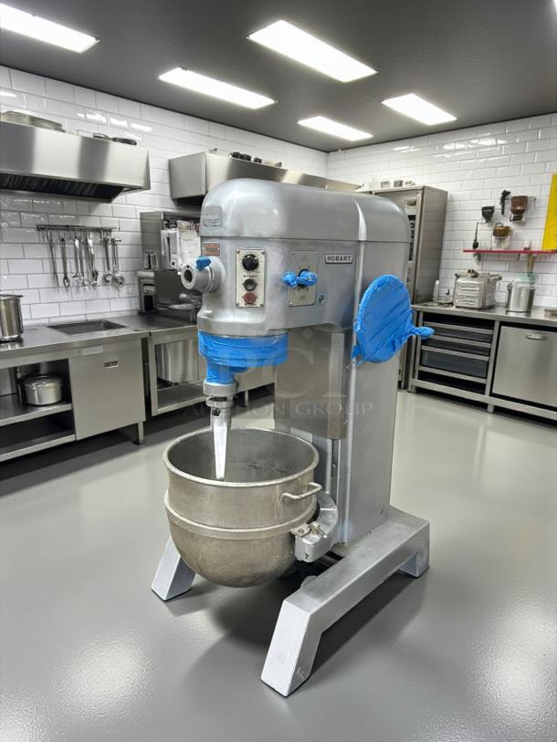 Hobart H600T 60QT dough mixer, used, with timer, 220/240v, 1ph. Features stainless steel bowl, control knobs.