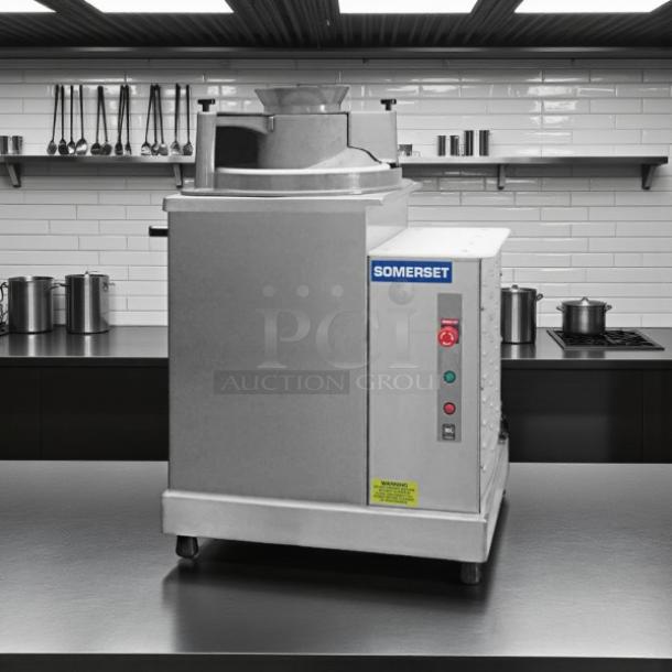 Somerset SDR-400 Dough Rounder, excellent condition, 110V. Tested and working. Stainless steel, visible controls.