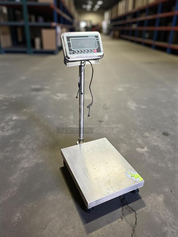 Uline H-5837 washdown platform scale, 200 lbs x 0.05 lb, in great condition. Includes 115v power, tested and working.