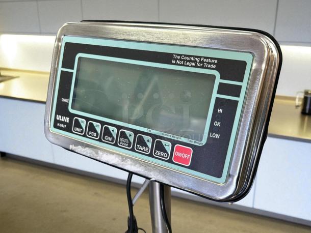 Uline H-5837 Washdown Platform Scale, 200 lbs x 0.05 lb, 115v. Great condition. Clear display with multiple function buttons.