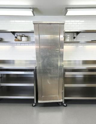New Age Industrial 1290PH full size enclosed bun pan rack for 40 pans, stainless steel, excellent condition, rolls smoothly.