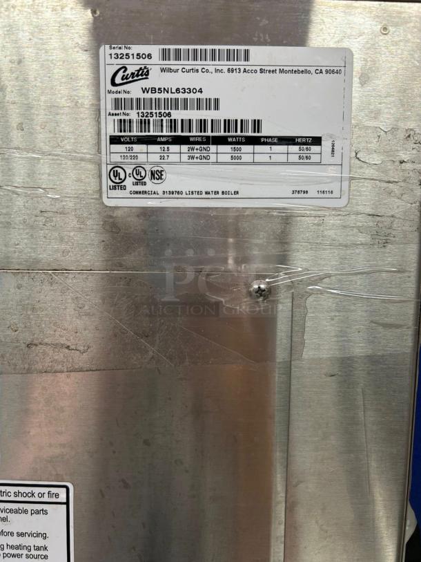 BUNN H5E Hot Water Dispenser, 120V/1800W, stainless steel, good condition, tested and working, model details on label.