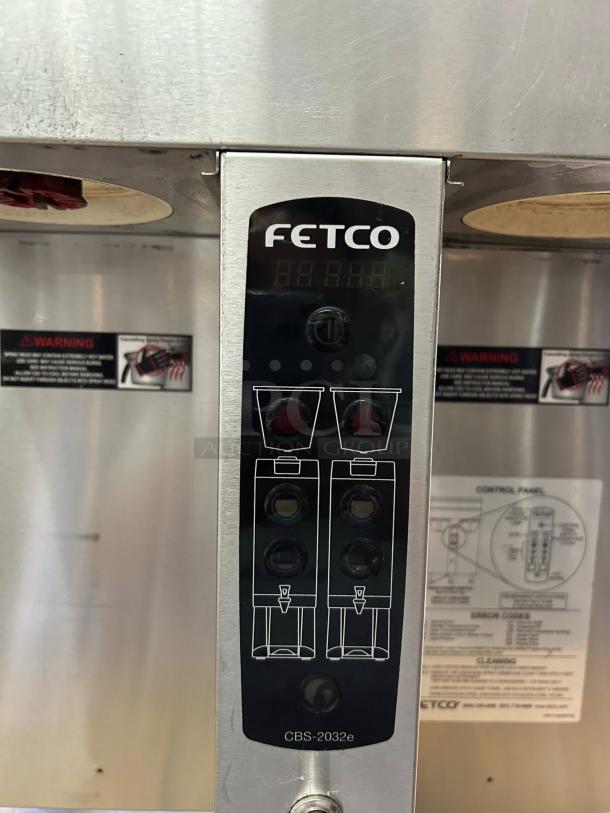 Fetco CBS-2032e coffee brewer in immaculate condition, tested and working. Dual 1-gallon capacity, 120/208 volts, control panel visible.