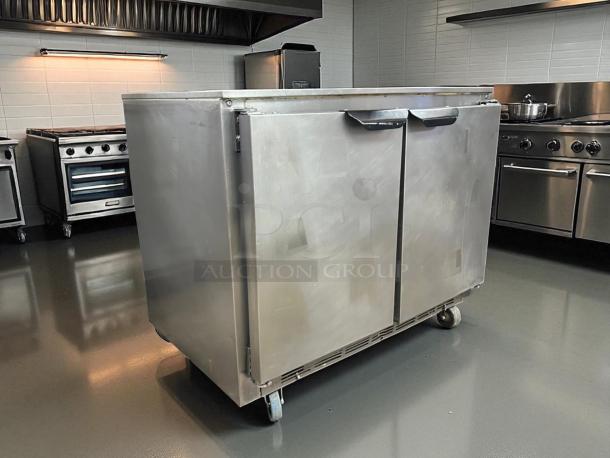Beverage-Air UCR34HC 34" undercounter refrigerator with two sections and doors, stainless steel, tested working condition.