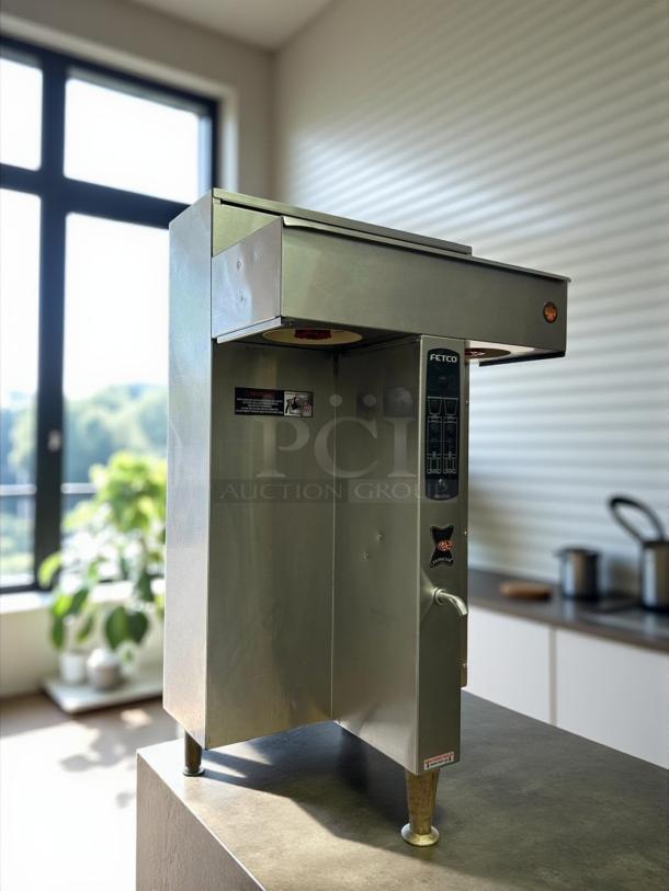 Fetco CBS-2042e twin 1-gallon coffee brewer in super nice condition, fully tested and working. Stainless steel finish.