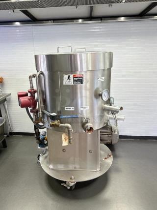 Savage Bros. #125 chocolate melter, 300 lb capacity, stainless steel, fully tested and working, labels "Water In" and "Chocolate Out."
