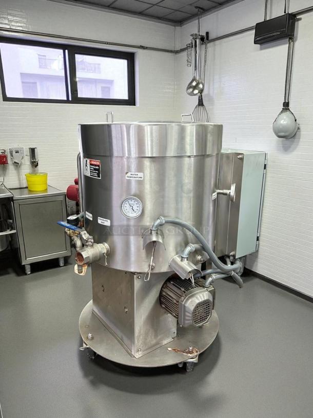 Savage Bros. Model #125 chocolate melter, 300 lb capacity, excellent condition, fully tested with temperature gauge visible.