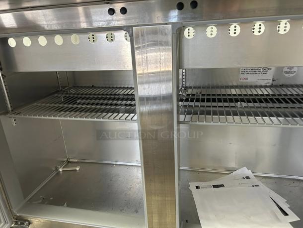 Continental SW48N18M sandwich prep table, 48", stainless steel, excellent condition, interior shelving, label indicates R290 refrigerant.