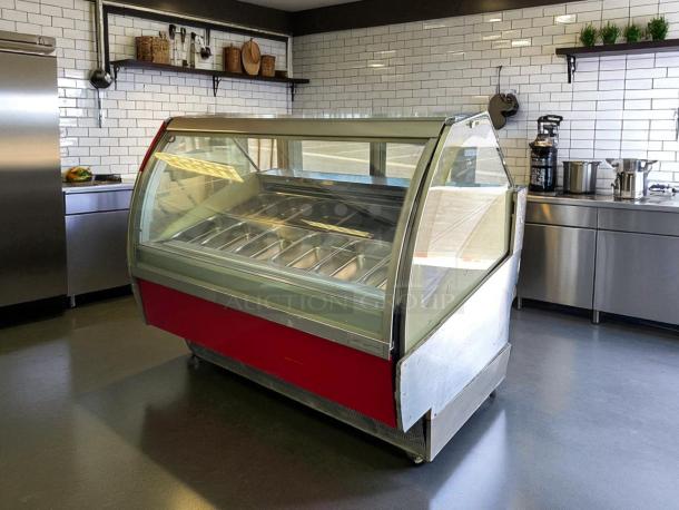 Oscartielle Model C83FK-9SC gelato ice cream case, 24 pans, excellent condition, 220V 1Ph, fully tested, red exterior.