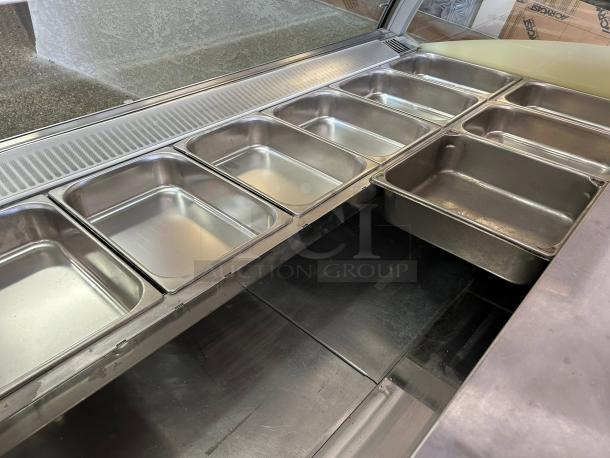 Oscartielle C83FK-9SC gelato case, excellent condition, 24-pan capacity. Stainless steel pans, 220V, fully tested and working.