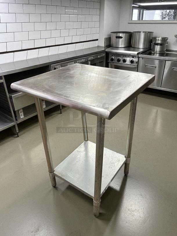 GSW 24" stainless steel worktop table with bottom galvanized shelf, in great condition. Ideal for kitchen use.