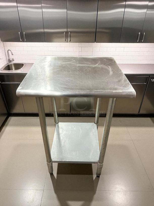GSW 24" stainless steel worktop table with bottom galvanized shelf, sturdy, in great condition, ideal for kitchens.