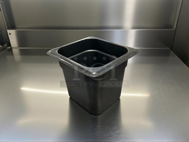 Cambro 66CW110 Camwear® 1/6 size black polycarbonate food pan, 6" deep, in excellent condition.