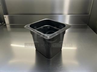 Cambro 66CW110 Camwear® 1/6 size black polycarbonate food pan, 6" deep, in excellent condition.