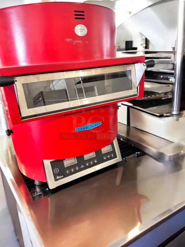 Red TurboChef Fire high-speed pizza oven, 240V, excellent condition, control panel visible, fully tested and working.