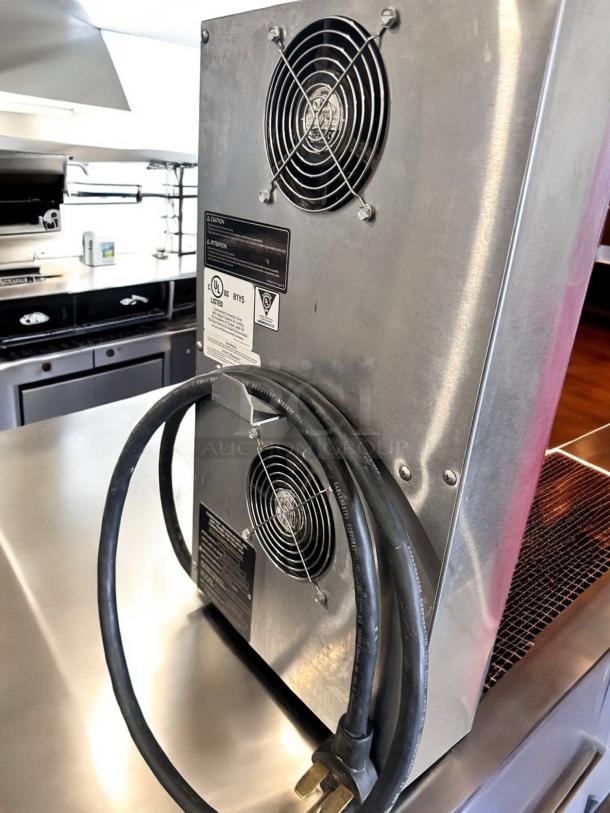 TurboChef Fire high-speed pizza oven, 240V, excellent condition. Features dual cooling fans, visible labels showing tested status.
