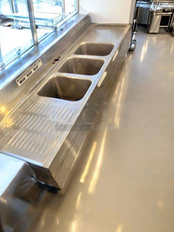 Supreme Metal 3-Compartment Underbar Sink with dual drainboards in excellent condition, NSF Certified, fully tested.