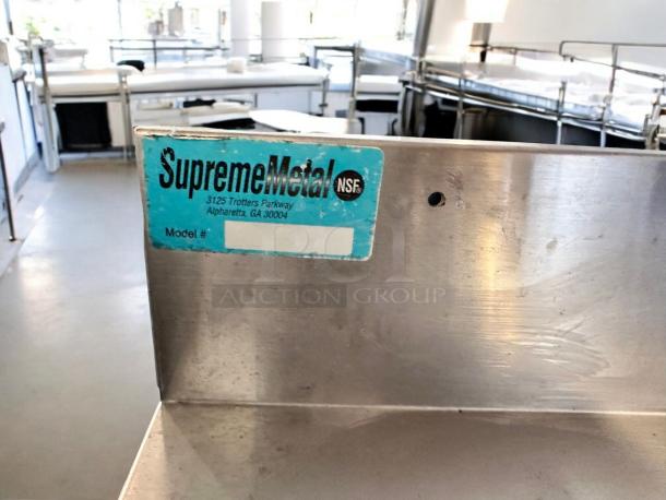Supreme Metal 3-compartment underbar sink with dual drainboards, NSF certified, excellent condition, label visible.