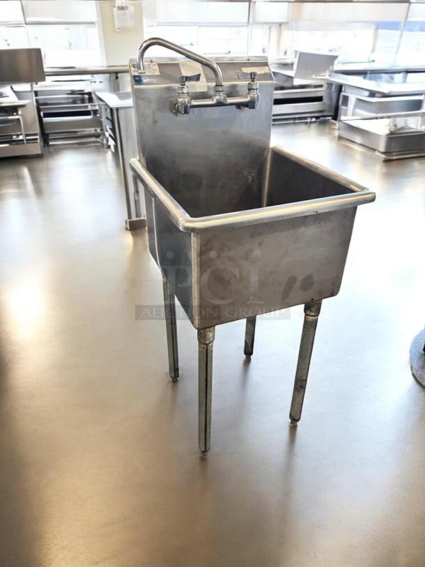 Heavy-duty stainless steel utility sink, single compartment, outstanding condition, fully tested and functional.