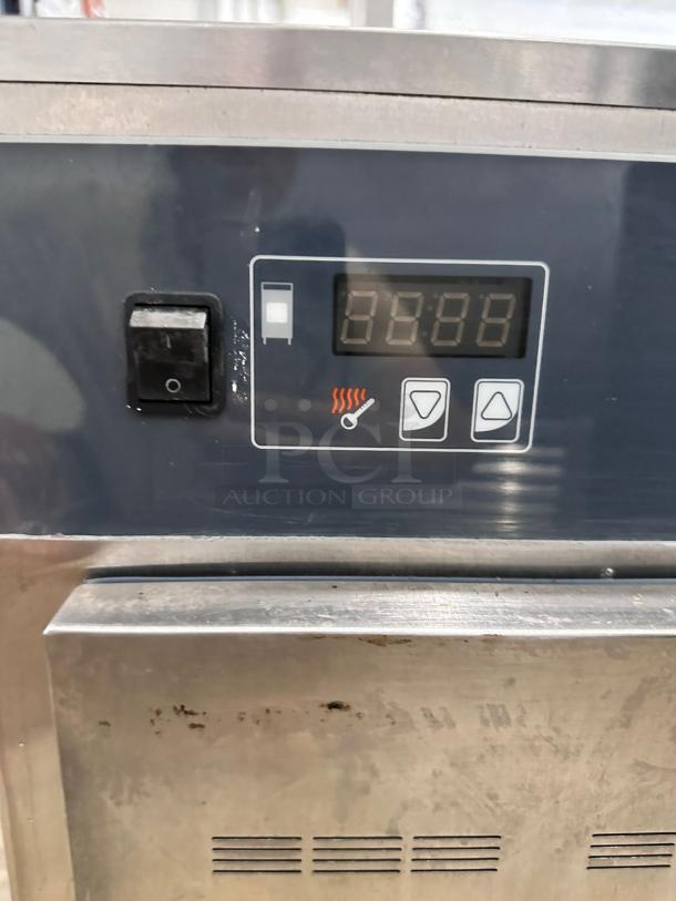 Alto-Shaam 500-S low-temp holding cabinet, 120V, excellent condition, digital controls visible, stainless steel exterior.