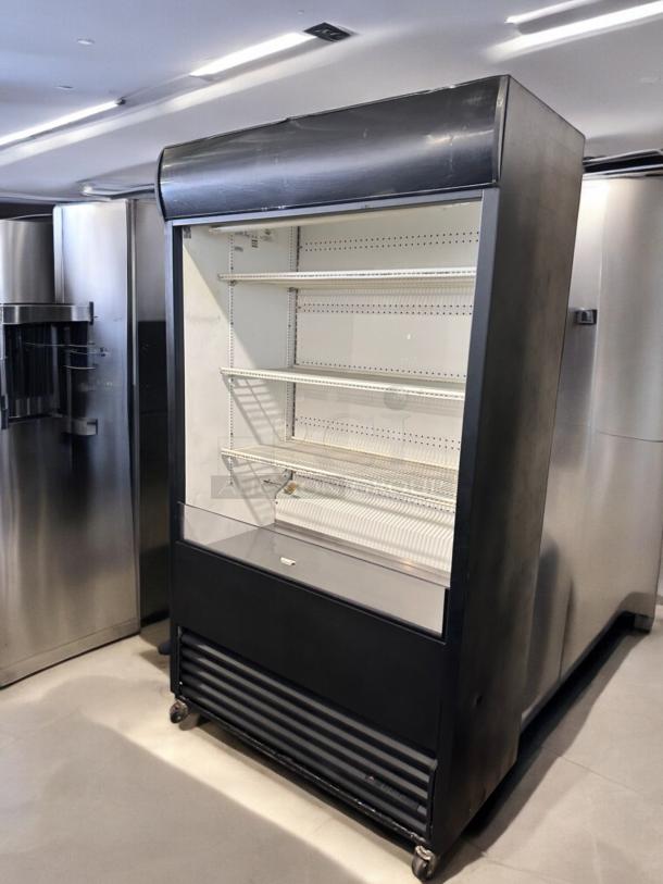 True TAC-48 air curtain merchandiser, excellent condition, black finish, shelves intact, 208/230V, fully tested.